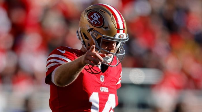 Jan 7, 2024; Santa Clara, California, USA; San Francisco 49ers quarterback Sam Darnold (14) celebrates after a play during the second quarter against the Los Angeles Rams at Levi's Stadium.